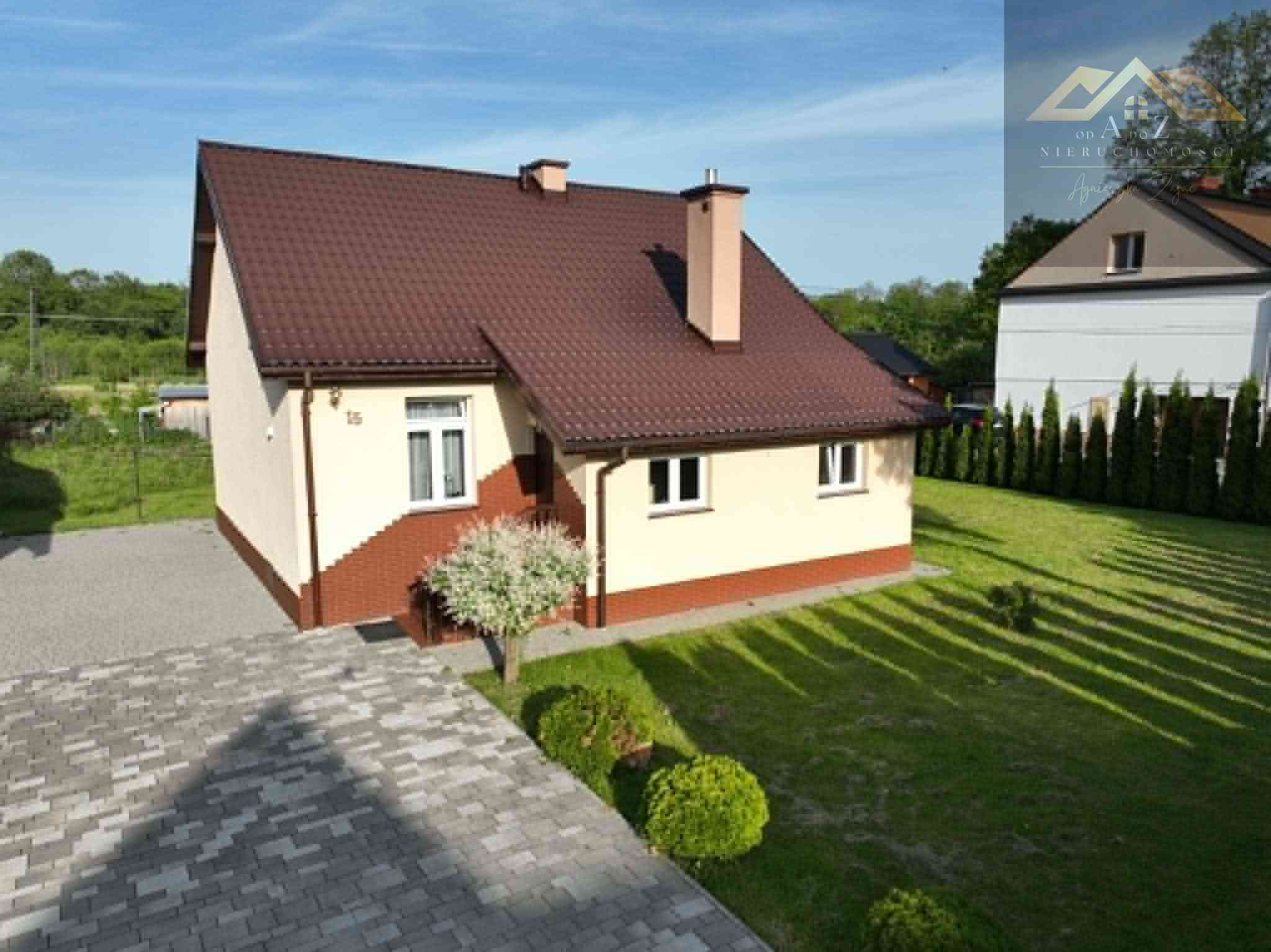 Dom z pięknym otoczeniem