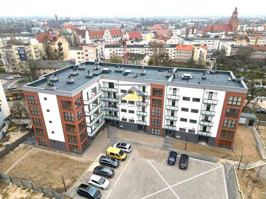 Miejsca postojowe w nowym budynku