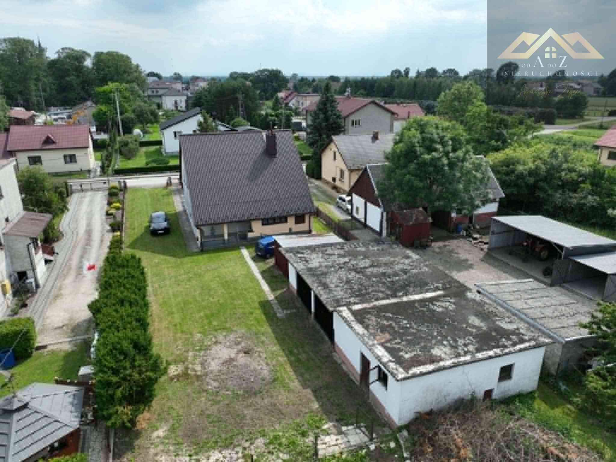 Duży dom z budynkiem gospodarczym i prawie 05ha działki budowlanej - zdjęcie 4