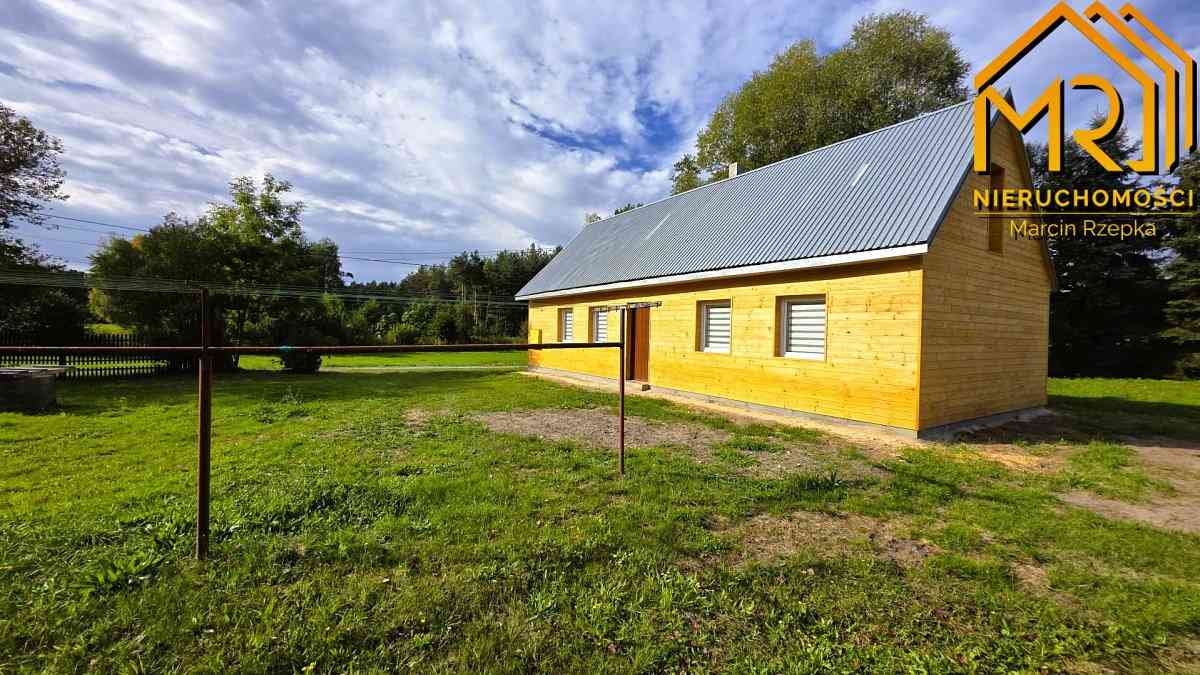 Drewniany dom na niespełna 0,20 ha – do zamieszkan - zdjęcie 3